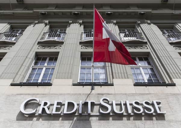 Credit Suisse is planning to cut thousands of jobs as it seeks to reduce costs. Picture: Peter Klaunzer/Keystone via AP
