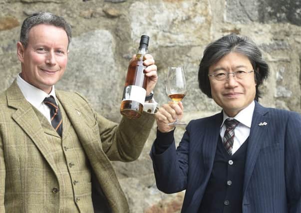 Lord Bruce, honorary patron of the Japan Society of Scotland, and Hajime Kitaoka, consul general of Japan, toast the creation of the first ever Scottish-Japanese whisky in 2015. Picture: Greg Macvean