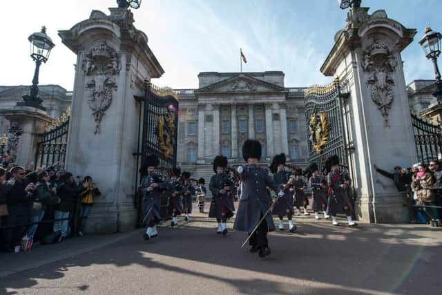 The Scots Guards Pipes and Drums while Changing the Guard at Buckingham Palace. Picture: PA