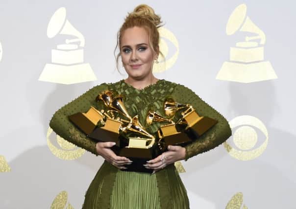 At the Grammy awards, Adele performed George Michaels song Fast Love, in which the late singer reflected on the life of a gay man in search of love or sex. Picture: Chris Pizzello/Invision/AP