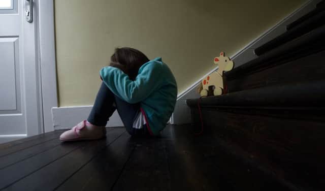 Photographs portraying the sensitive topic of child abuse can themselves create a distorted image. Picure: John Devlin