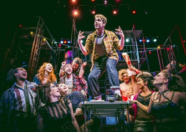 Billy Cullum (centre) as Mark with the cast of RENT. Picture: Matt Crockett