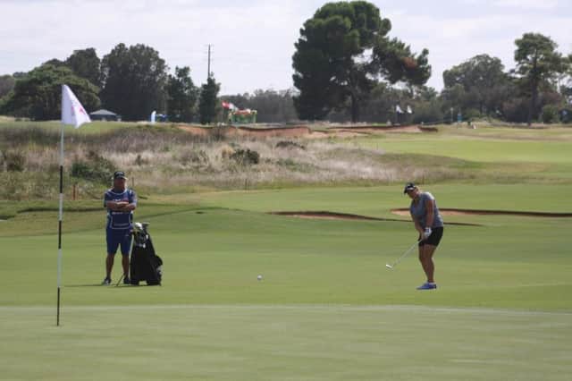 Michele Thomson chips at the 15th on her way to an opening 68 in the Australian Womens Open in Adelaide.