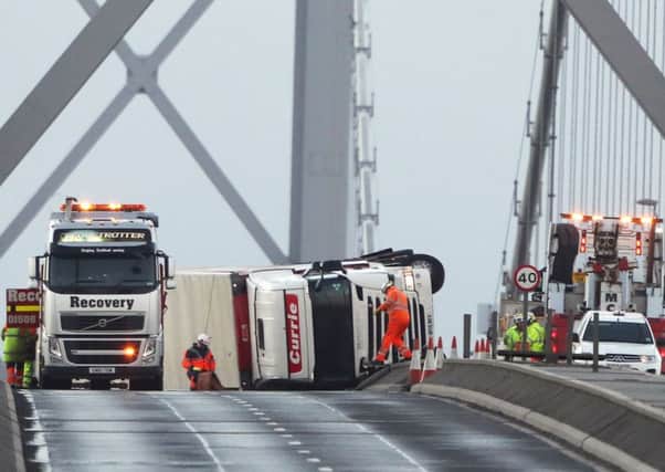 The closure of the Forth Road Bridge for 19 hours last month after a lorry overturned has prompted Transport Minister Humza Yousaf to see if the law needs to be changed. Picture: Andrew Milligan/PA