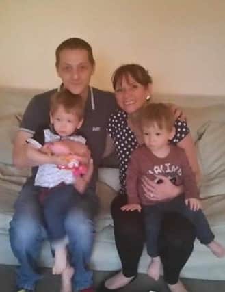 Rhys and Shaun with parents Mervyn and Sarah. Picture: SWNS