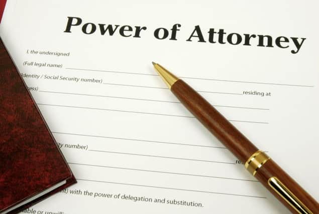 Power of Attorney document waiting to be filled in and signed.
