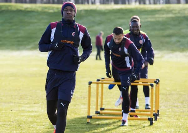 Arnaud Djoum is put through his paces at Riccarton ahead of Hearts home clash with Inverness. Picture: SNS.
