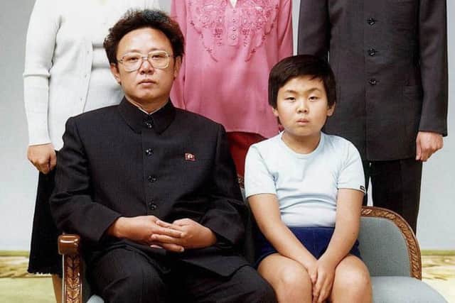 Favoured son 
Jong-nam in a family portrait with his father, Kim Jong-il, in 1981. Picture: AFP/Getty