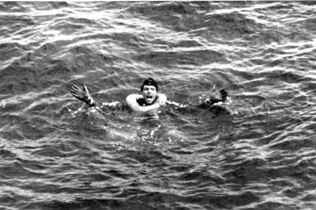 A German U-boat survivor shouts for help after his sub was sank during World War II.