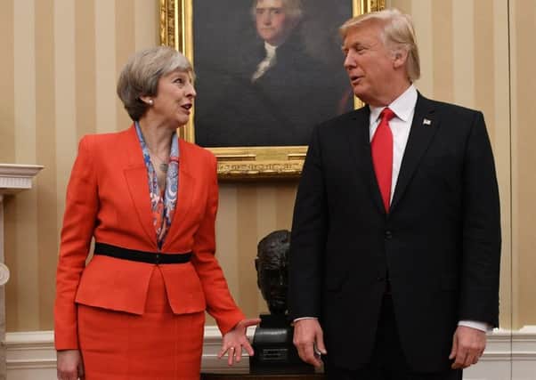 Theresa May meeting Donald Trump in Washington. Picture: PA