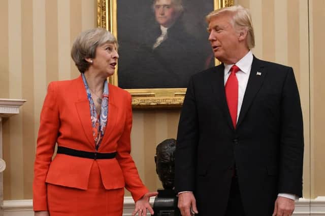 Theresa May meeting Donald Trump in Washington. Picture: PA