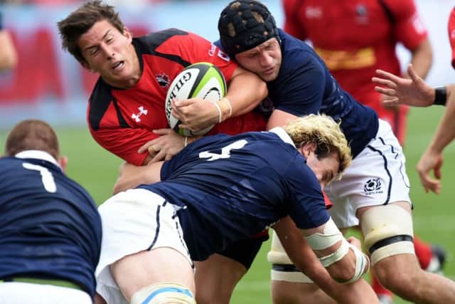 Scotlands Richie Gray and Kieran Low, right, in action against Canada at the BMO Stadium in Toronto in 2014. Picture: Craig Watson/SNS