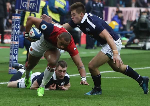 Huw Jones tackles Gael Fickou last week. Picture: David Rogers/Getty Images)