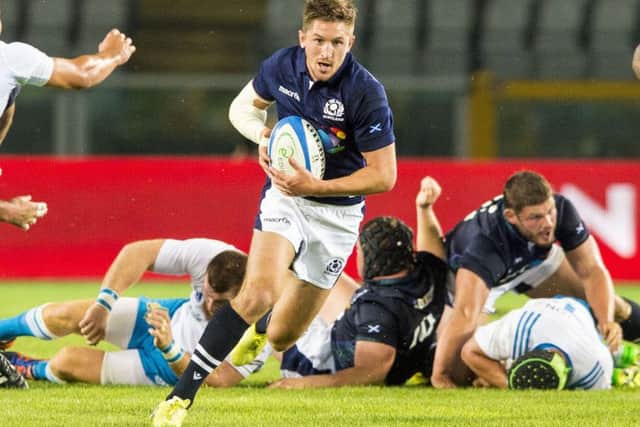 Henry Pyrgos in action for Scotland.