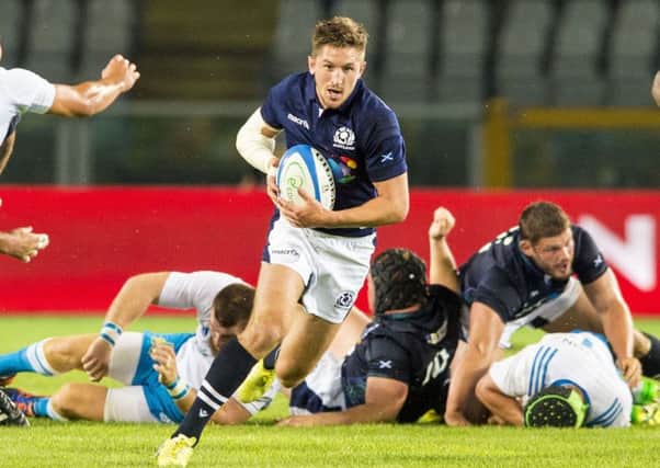 Henry Pyrgos in action for Scotland.