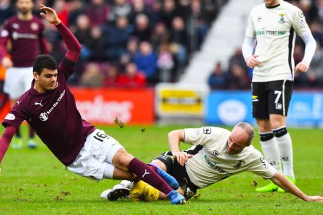 Hearts winger Choulay and Inverness' David Raven battle for the ball. Picture: SNS/Alan Harvey