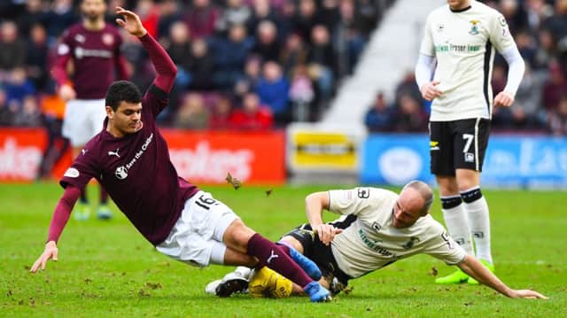 Hearts winger Choulay and Inverness' David Raven battle for the ball. Picture: SNS/Alan Harvey