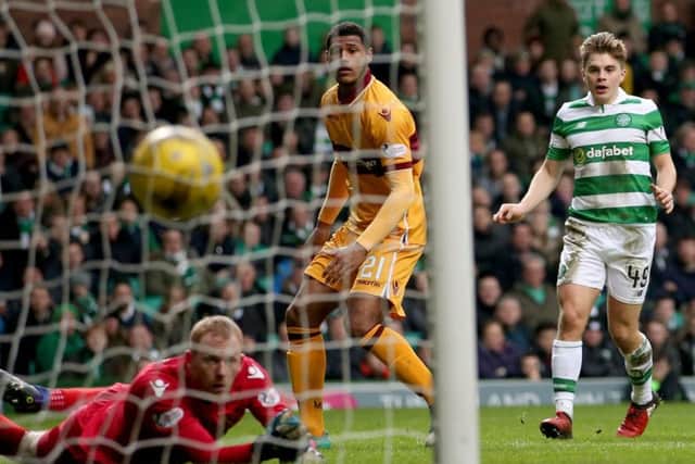 James Forrest scores his Celtic's second. Picture: Jane Barlow/PA Wire