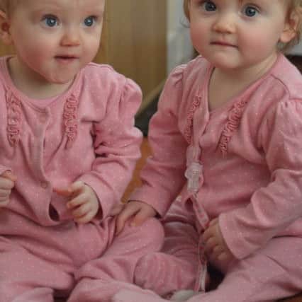 Twins Leah and Erin on their first birthday.Picture: SWNS