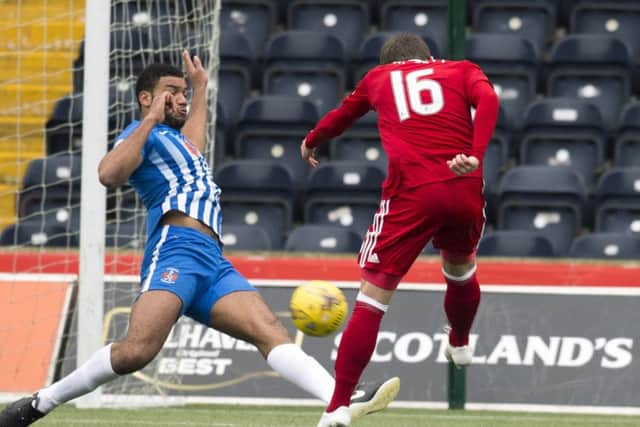 Peter Pawlett fires home the winning goal for Aberdeen at Kilmarnock. Picture: SNS.