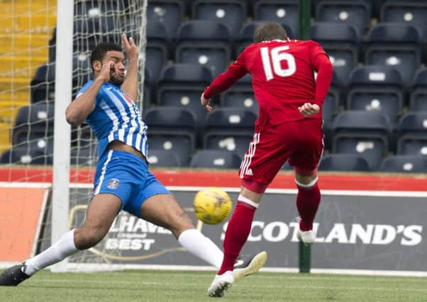 Peter Pawlett fires home the winning goal for Aberdeen at Kilmarnock. Picture: SNS.
