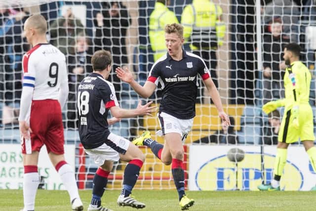 Dundee's Mark O'Hara celebrates after opening the scoring. Picture: SNS
