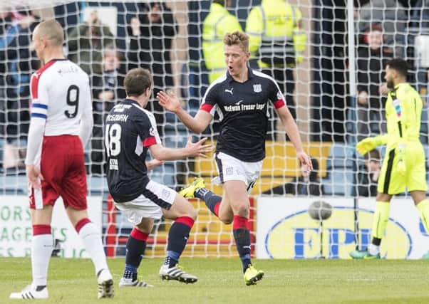 Dundee's Mark O'Hara celebrates after opening the scoring. Picture: SNS