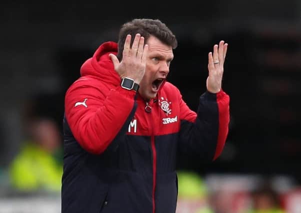 Graeme Murty vents his frustration during the 2-1 defeat at Dens Park yesterday. Picture: PA.