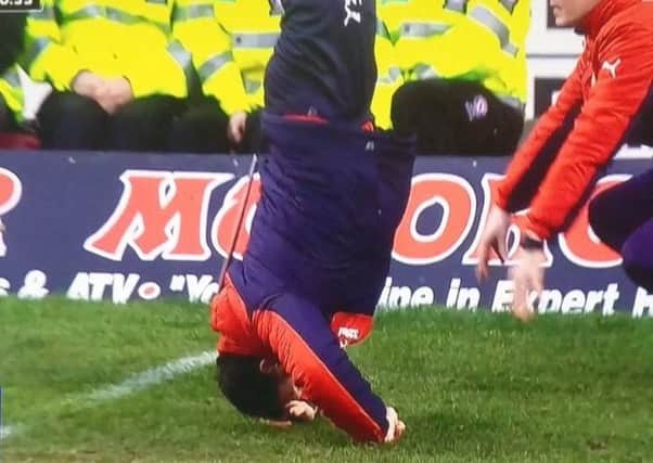 Rangers interim manager Graeme Murty cuts a frustrated, upside down figure.