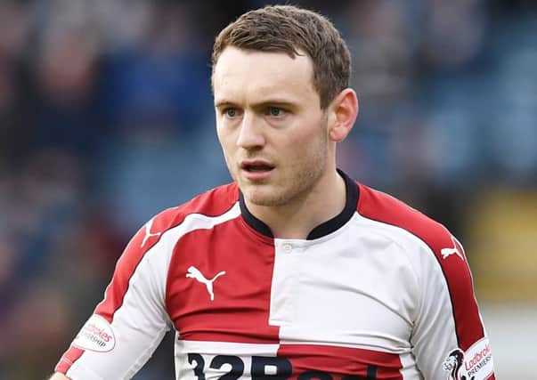 Rangers' Lee Hodson missing the club badge on his shirt. Picture: SNS