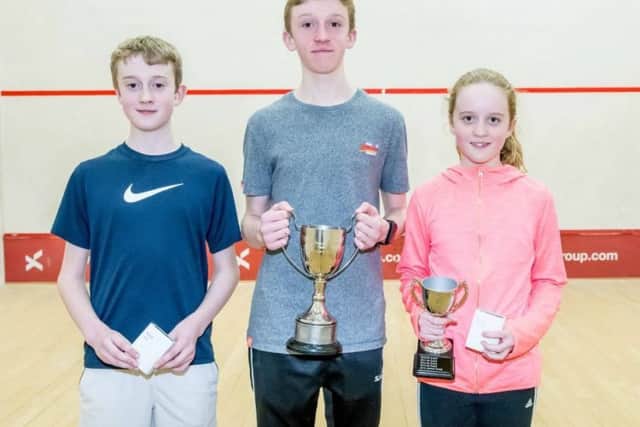 The McDougall siblings  left to right, Findlay, Ruadhri and Orla  line up with their prizes.
