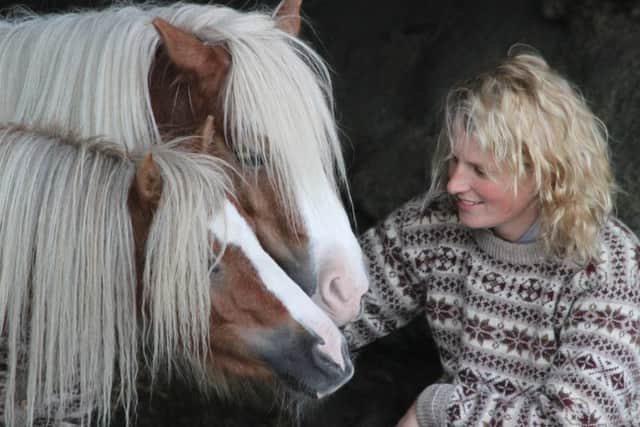 Emma Massingale with ponies Albert and Ernie. Picture: SWNS