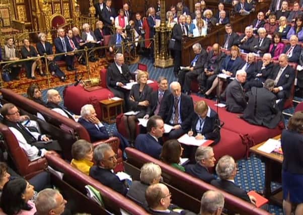 Prime Minister Theresa May sits behind the speaker (top left) as the Brexit Bill debate starts in the House of Lords. Picture: PA