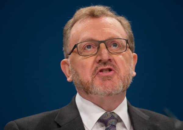 Scottish Secretary David Mundell speaks on the third day of the Conservative party conference at the ICC in Birmingham. Picture: Stefan Rousseau/PA Wire