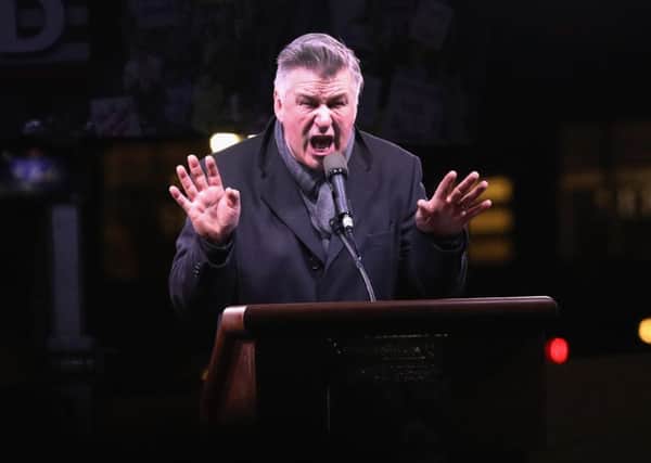 Actor Alec Baldwin impersonates Donald Trump at a rally. Baldwin regularly impersonates Trump on TV show Saturday Night Live. Picture: Getty Images