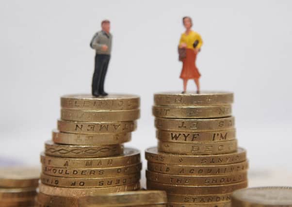 The gender pay gap in Scotland currently stands at 15 per cent. Picture: PA
