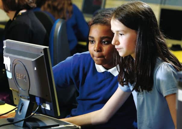 Girls work on their programming skills at an Edinburgh primary school. Picture: Tom Finnie/ComputerXplorers