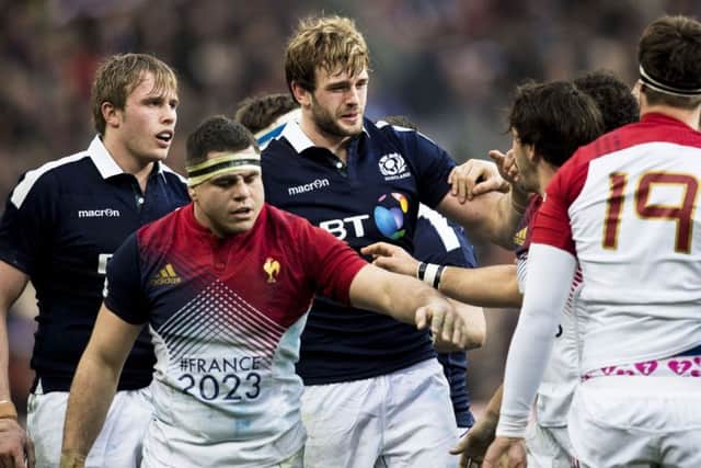 Jonny and Richie Gray square up to the French forwards during Scotland's defeat in Paris. Picture: SNS