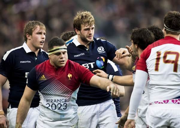 Jonny and Richie Gray square up to the French forwards during Scotland's defeat in Paris. Picture: SNS