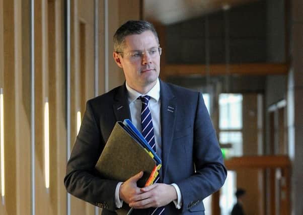 Derek Mackay's decision to cap rates rises has been welcomed, albeit tentatively. Picture: Lisa Ferguson
