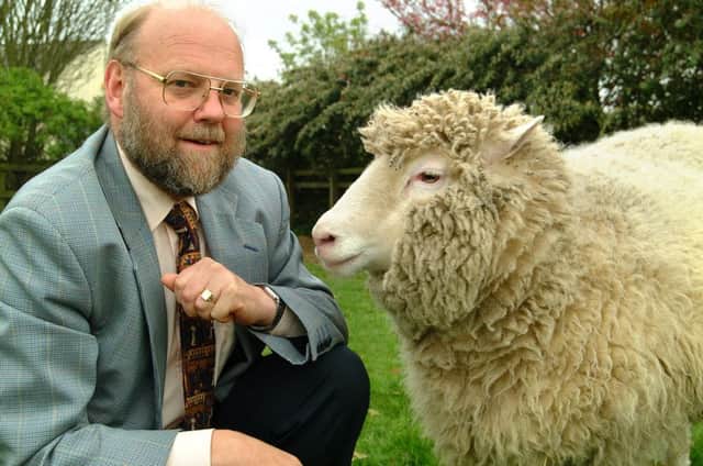 Professor Sir Ian Wilmut with Dolly. Picture: The Roslin Institute