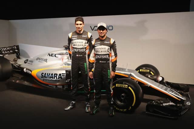 Sahara Force India drivers Sergio Perez, right, and Esteban Ocon unveil their new VJM10 car at Silverstone. Picture: Mark Thompson/Getty Images