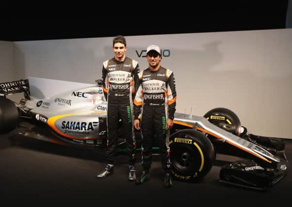 Sahara Force India drivers Sergio Perez, right, and Esteban Ocon unveil their new VJM10 car at Silverstone. Picture: Mark Thompson/Getty Images