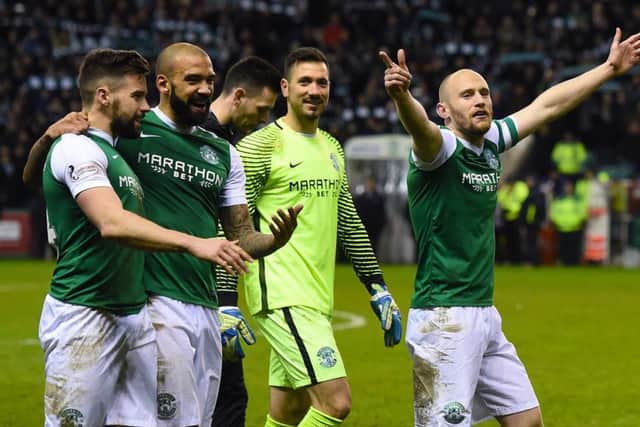 Hibernian's players celebrate at full time. Picture: SNS