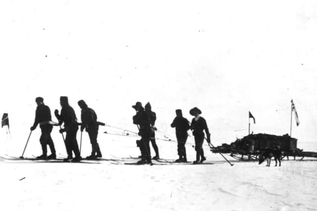 Captain Scott leads a sleigh party over the ice.  Photo: Hulton Archive/Getty Images