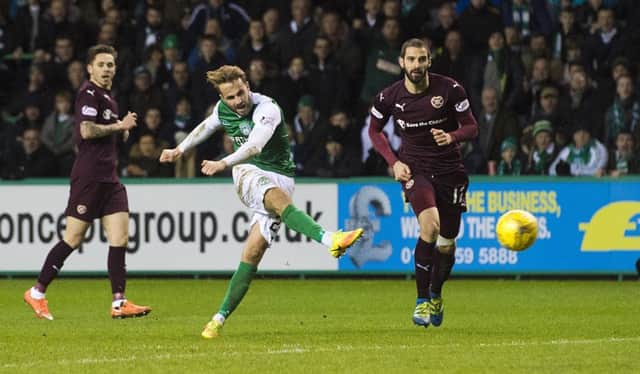 Andrew Shinnie scores Hibs' third in the win over Hearts. Picture: Craig Foy/SNS