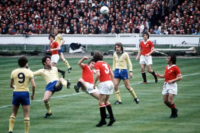 Lou Macari, right, looks on as another two Scots, Southamptons Jim McCalliog and Uniteds Martin Buchan battle for possession in the Wembley showpiece. Picture: Bob Thomas/Getty Images)