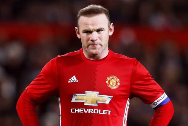Wayne Rooney has been linked with a move to the Chinese Super League but is staying put for now. Picture: Martin Rickett/PA Wire