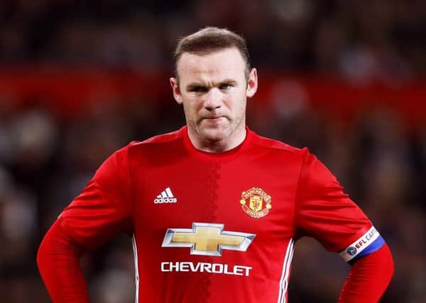 Wayne Rooney has been linked with a move to the Chinese Super League but is staying put for now. Picture: Martin Rickett/PA Wire