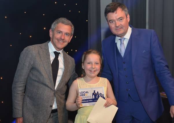 Steven Jardine and Grant Stott present an award. Picture: TSPL